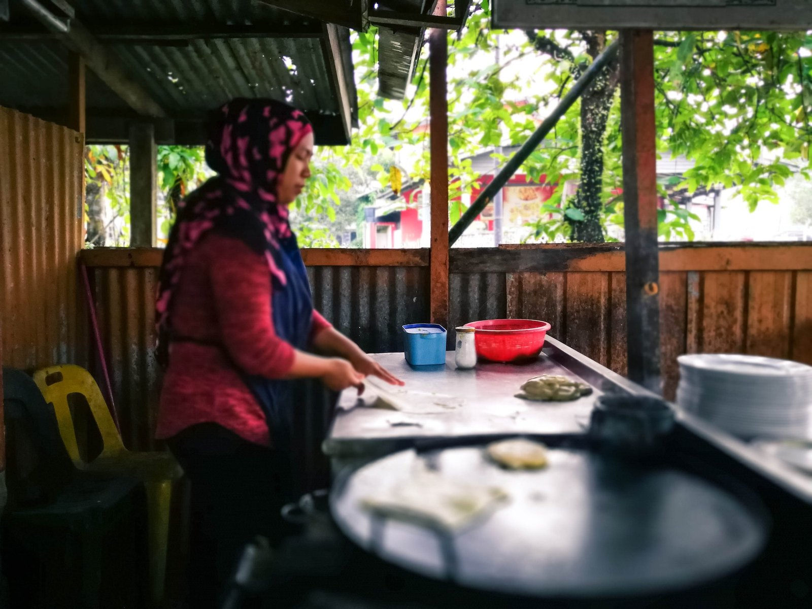 Making of Roti Canai or Roti Prata famous Indian margarine flatbread in Malaysia.